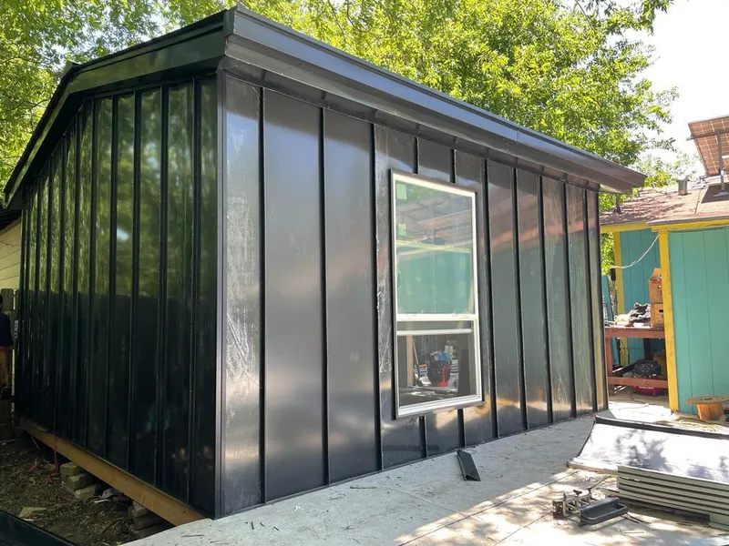 Black standing seam metal wall panels for Metal Roof Installation in Hampstead